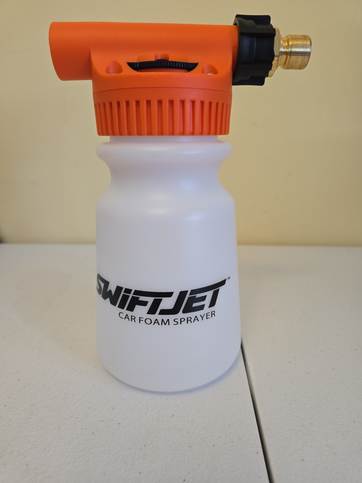 The product is a SwiftJet Car Foam Sprayer designed for car washing using a…